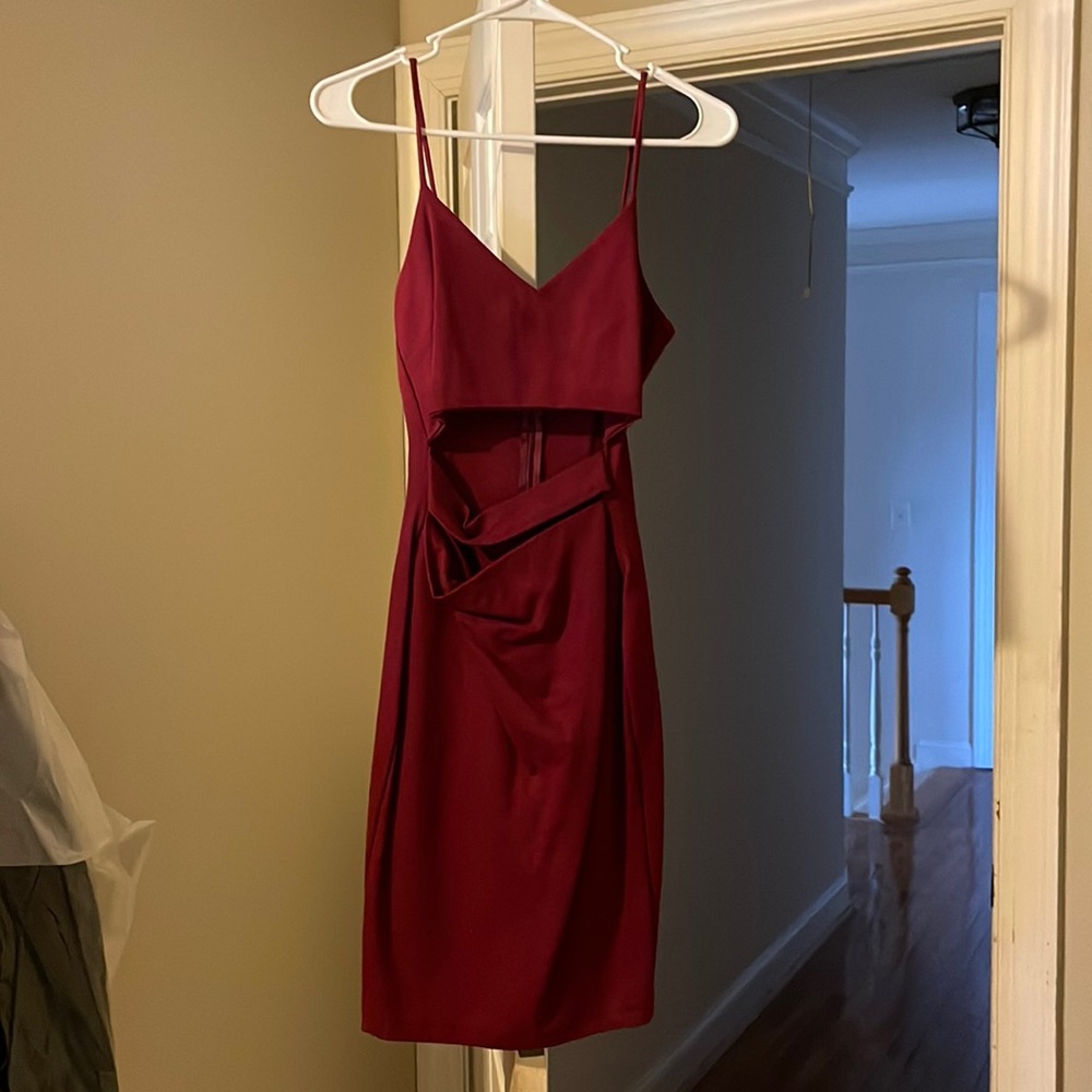 Burgundy dress with straps and front torso cut-outs